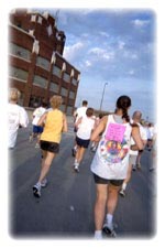 Women Running Toward Horizon